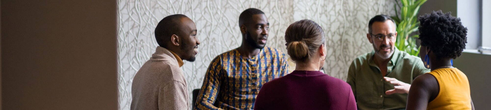 Five recruiters sat discussing strategy 