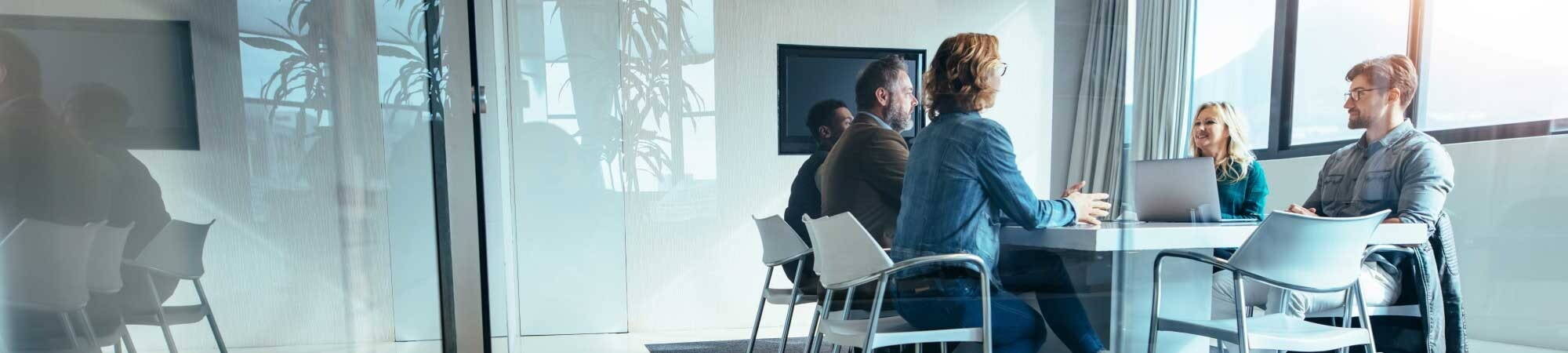 Five recruiters sat in glass boardroom 