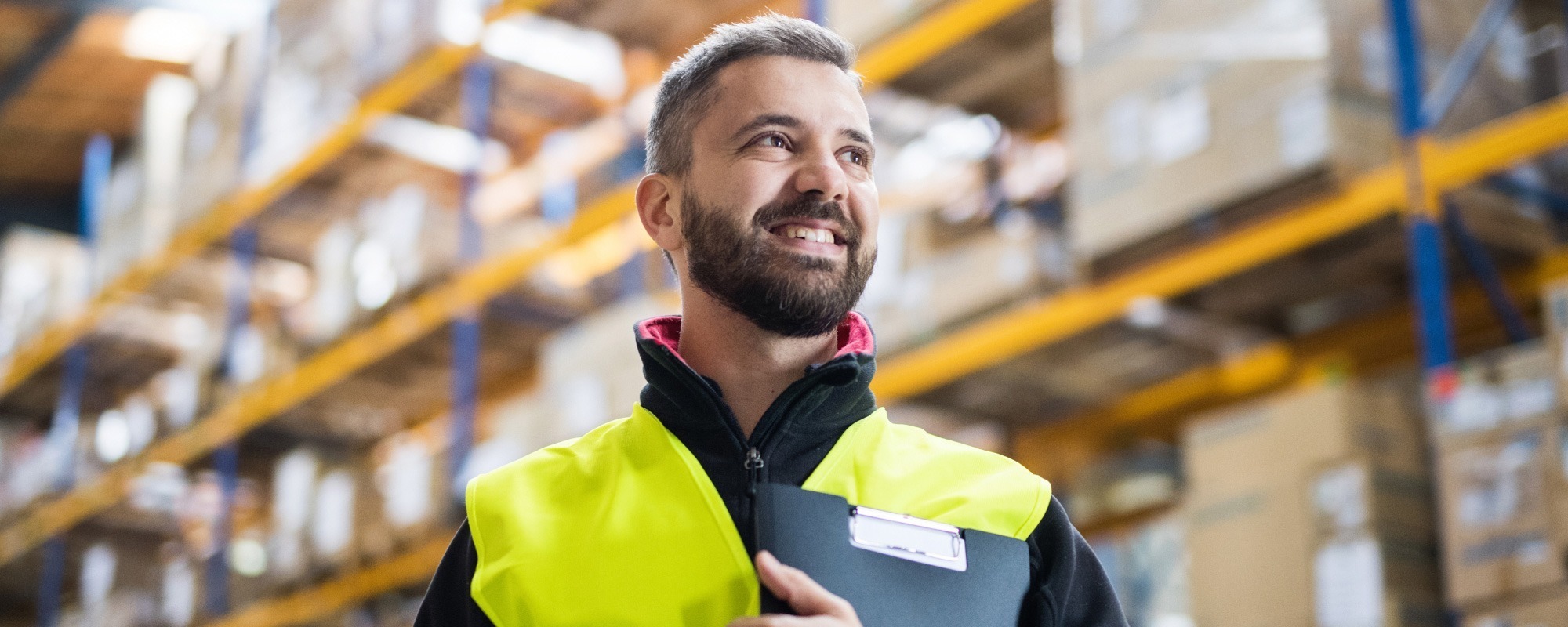 Man in high-visibility vest representing industrial recruitment workforce