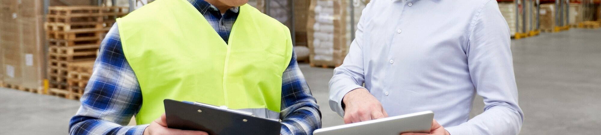 2 people working in a warehouse 